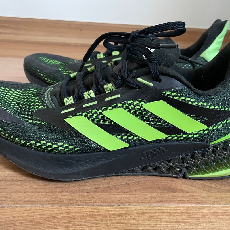 Tenis adidas preto com 2024 verde