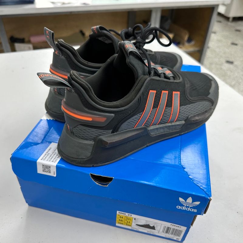 Nmd preto e store laranja