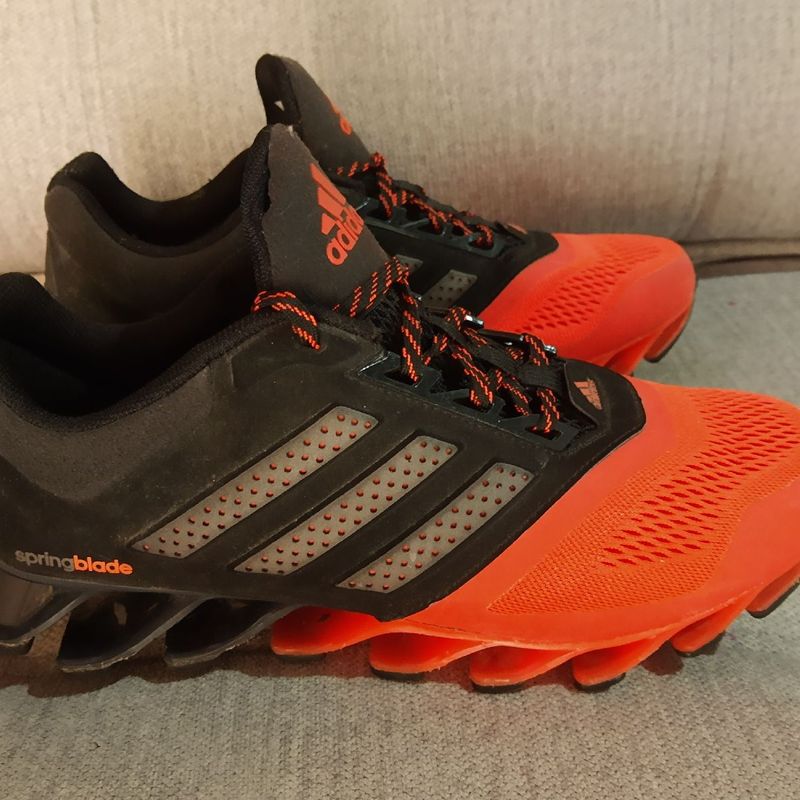 Adidas springblade black and orange hotsell