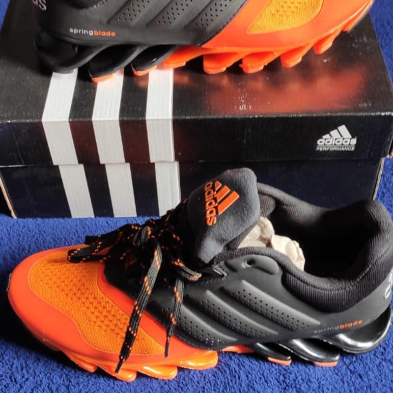 Adidas springblade best sale laranja e preto