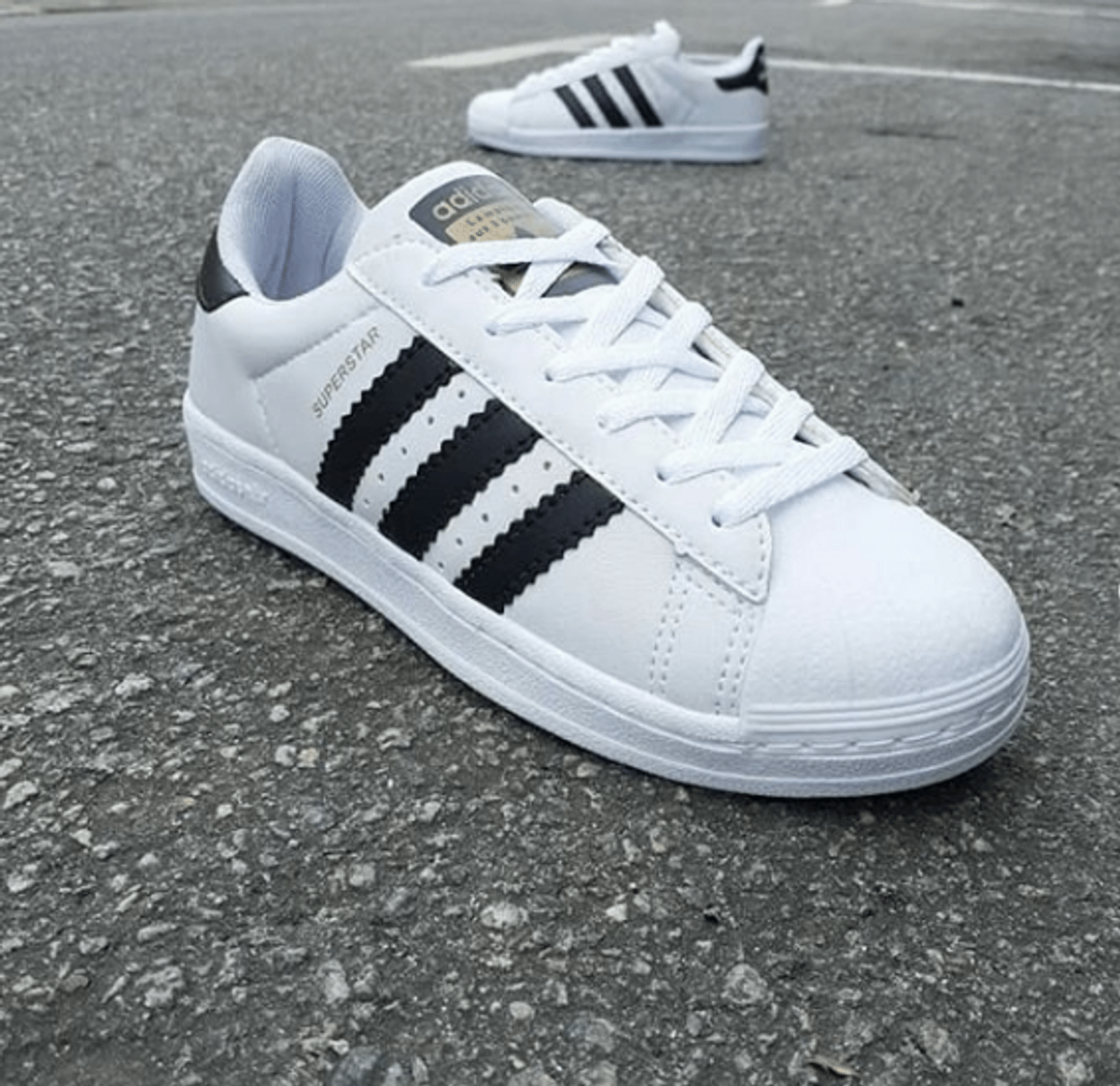 tenis adidas superstar feminino branco e preto