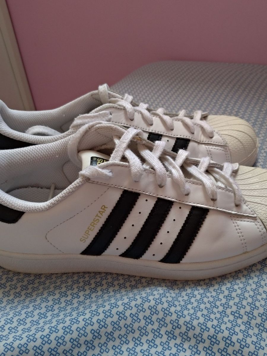 tenis adidas feminino branco com listras pretas