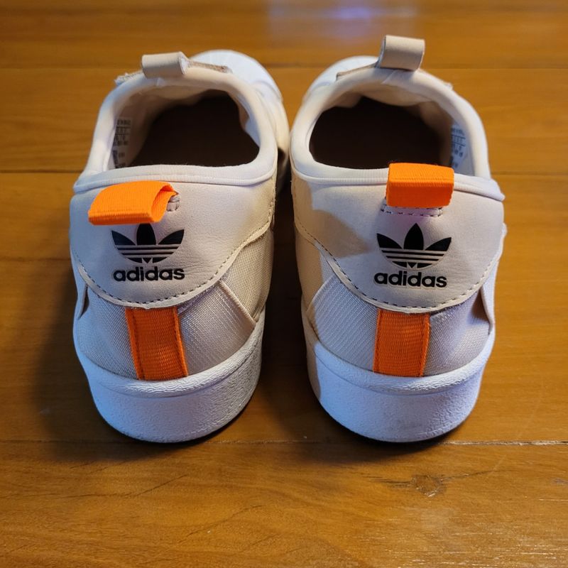 Adidas superstar slip hot sale on homme orange