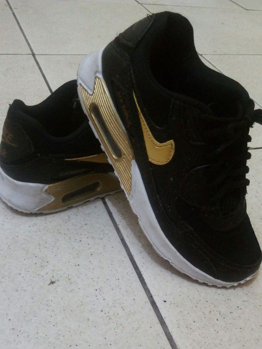 nike preto e dourado feminino