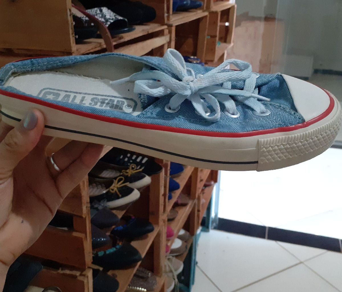 tenis all star aberto atras