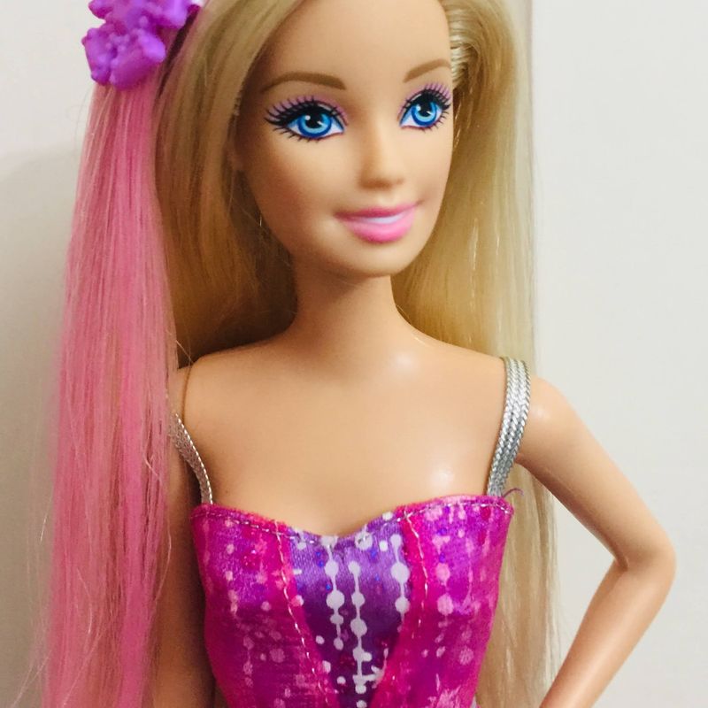 Barbie with pink store streak in hair