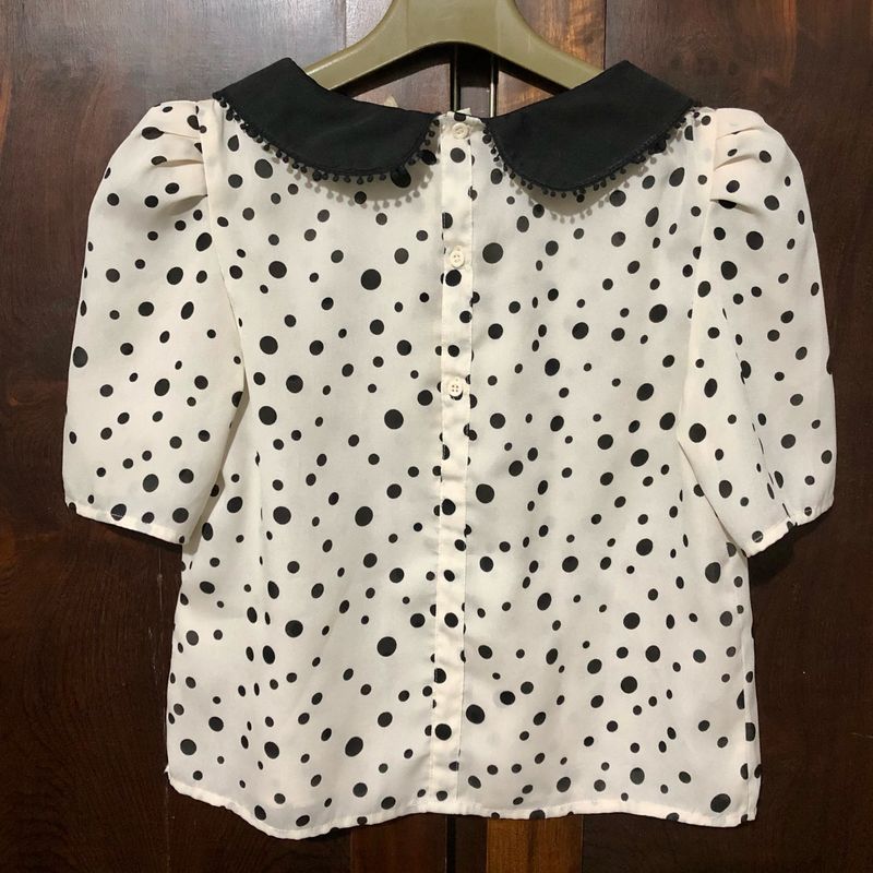 Blusa de bolitas discount negras