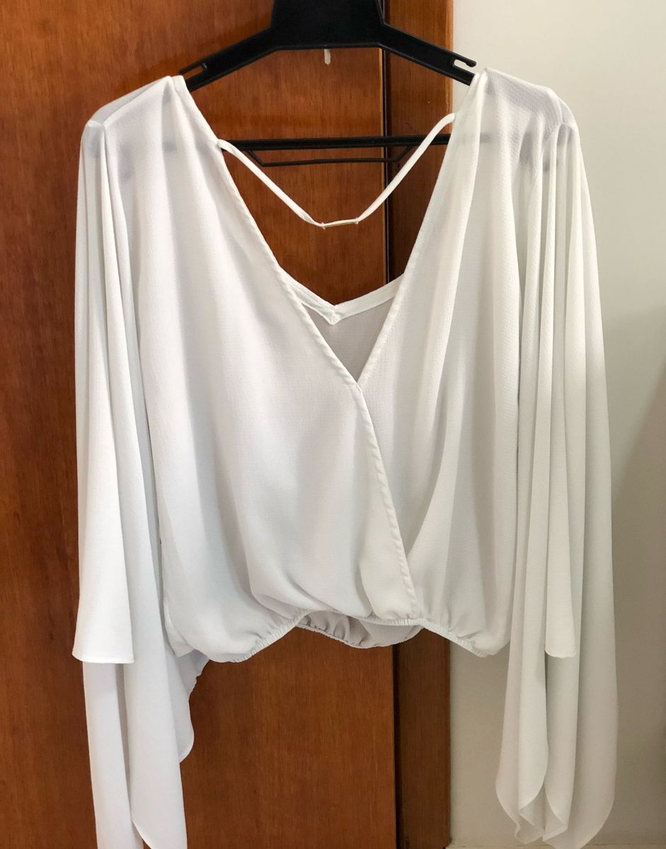 camisa manga morcego