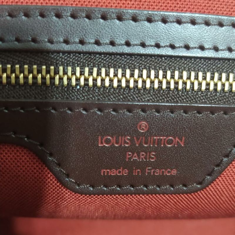 Etiqueta discount louis vuitton