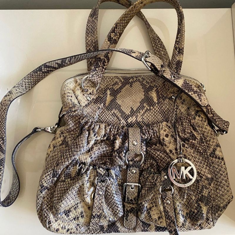 Bolsa michael best sale kors animal print