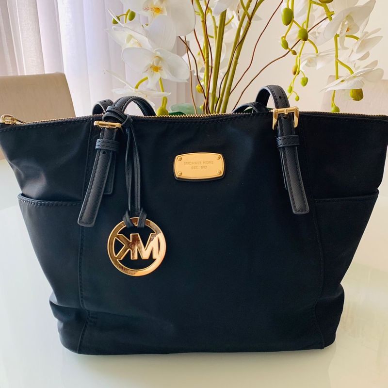 Bolsa michael kors est 1981 precio new arrivals