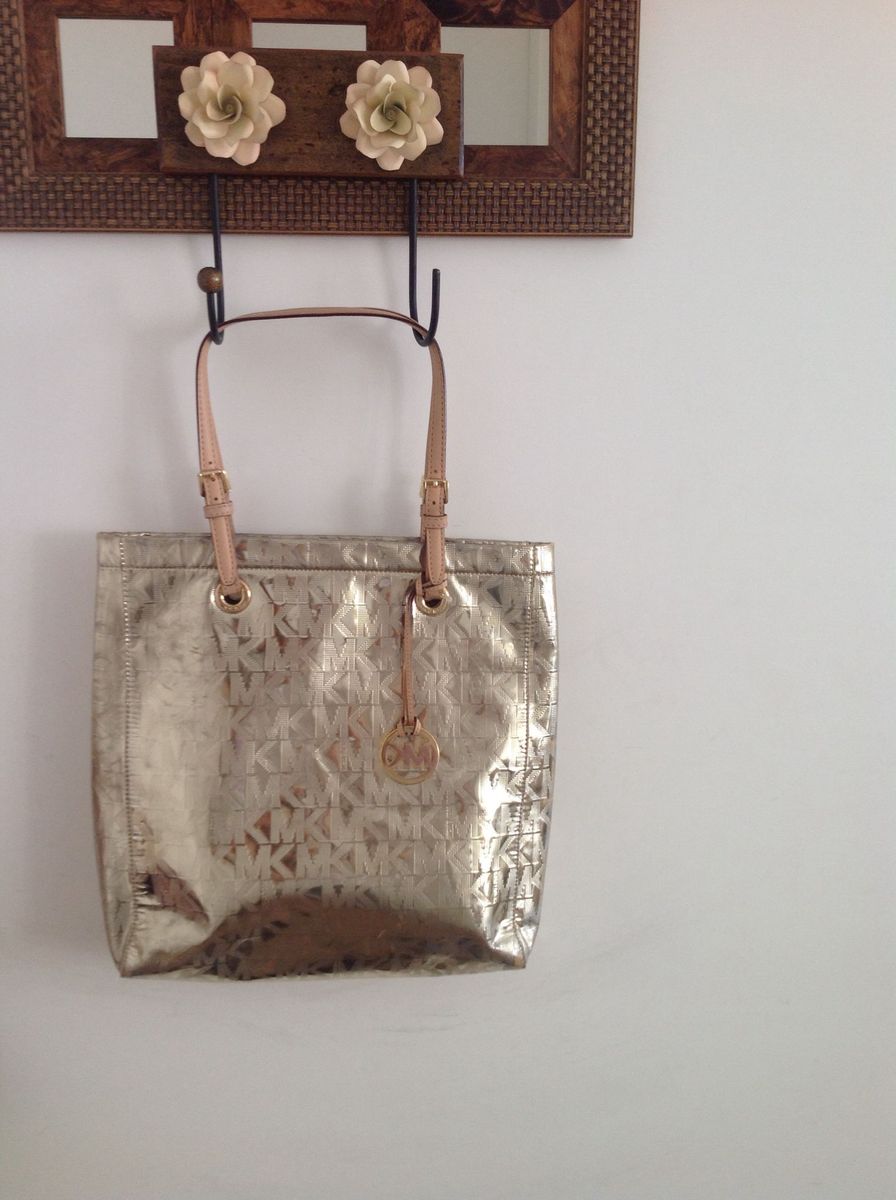 bolsa mk dourada