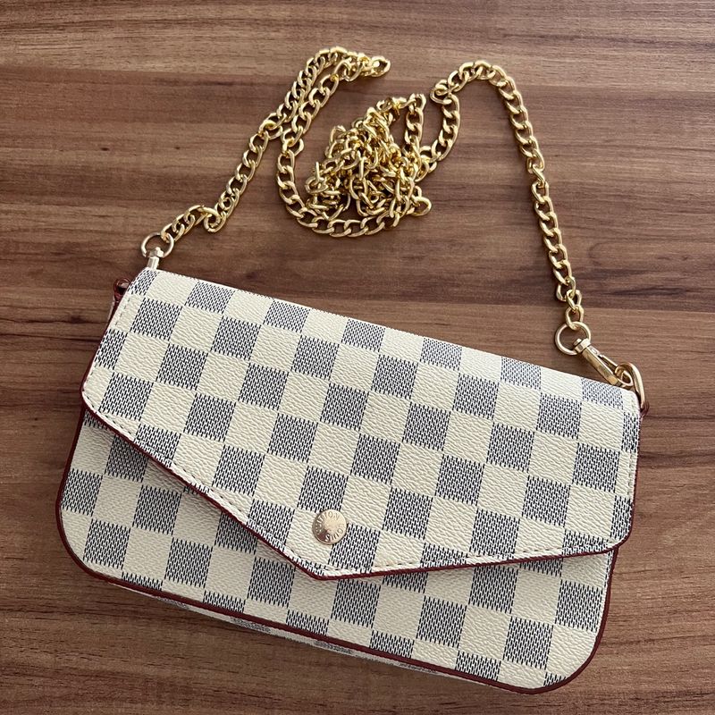 bolsa pequena clutch louis vuitton importada