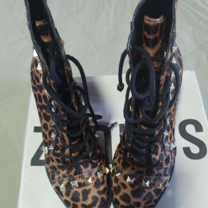 Coturno animal best sale print schutz