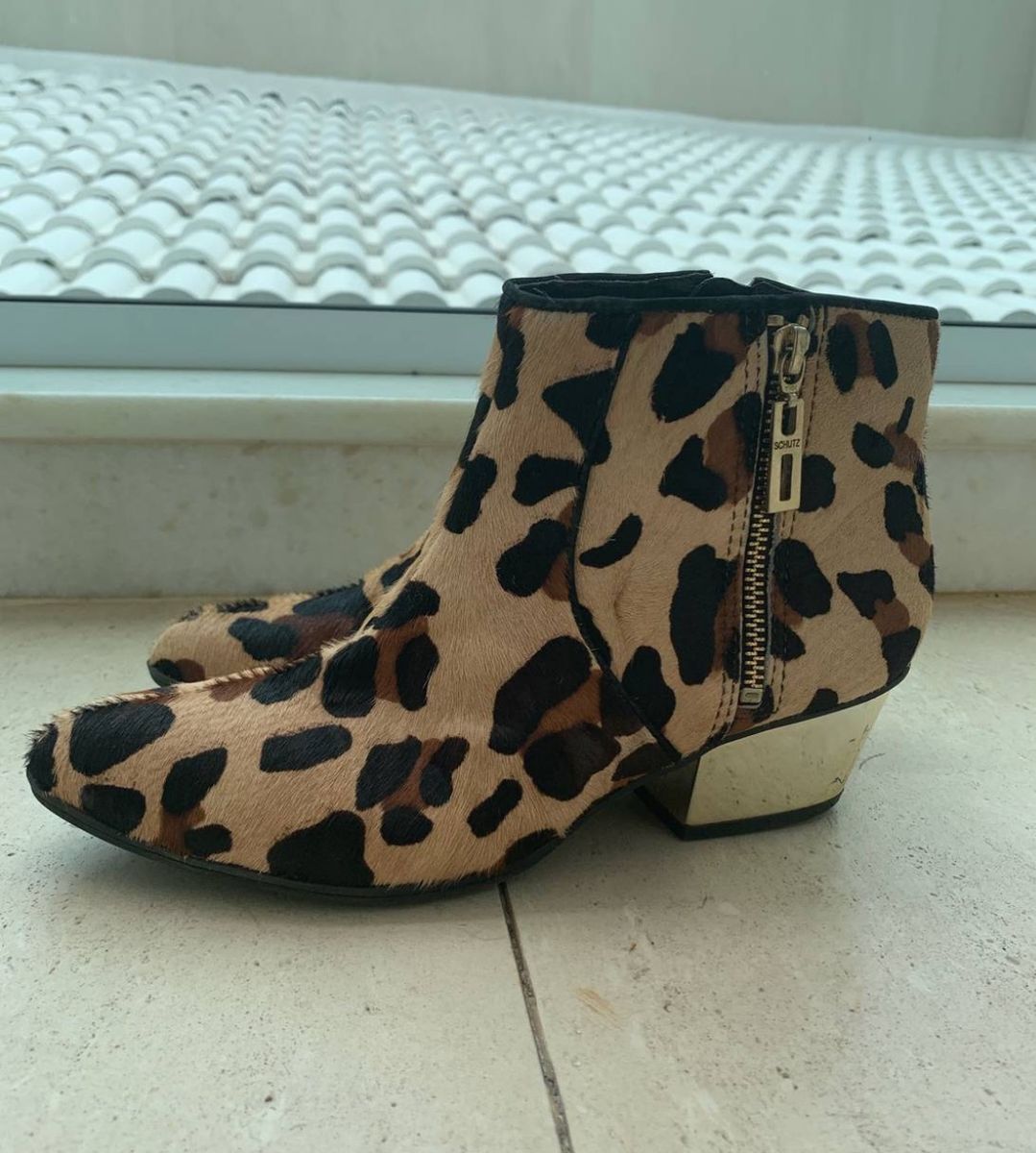 bota schutz onça