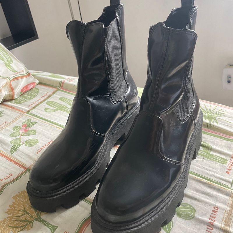 Renner clearance bota tratorada