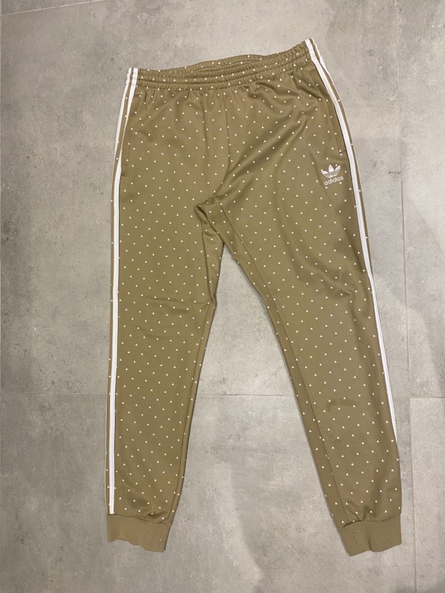 Calça adidas hot sale pharrell williams