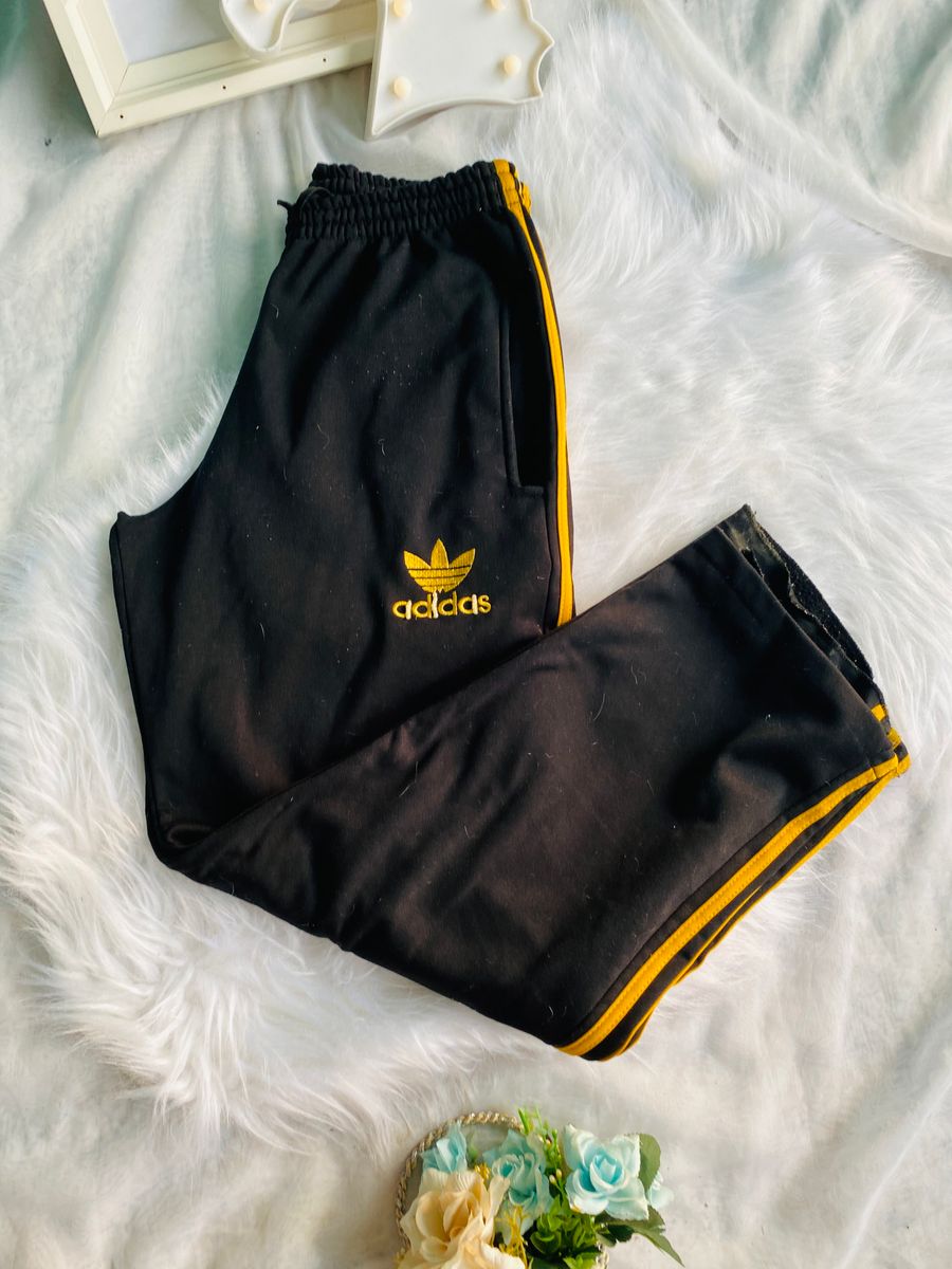 Adidas preto best sale e amarelo