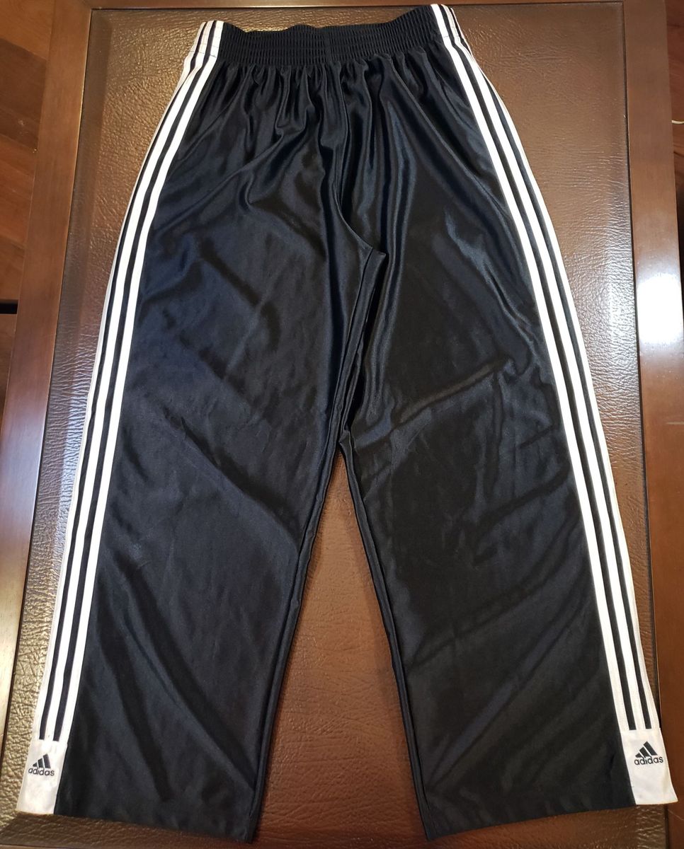 Calça com best sale botões laterais adidas