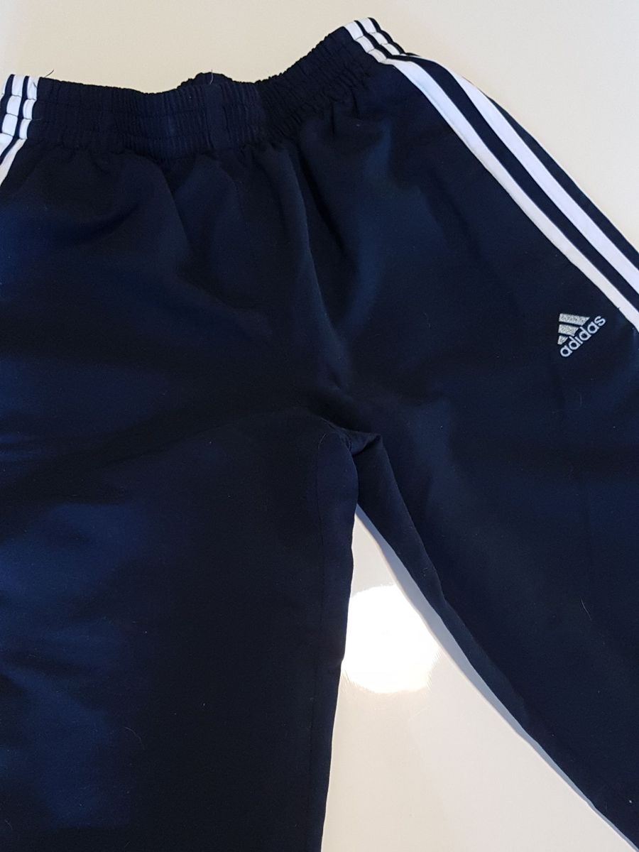 Calça adidas feminina com ziper hot sale na perna