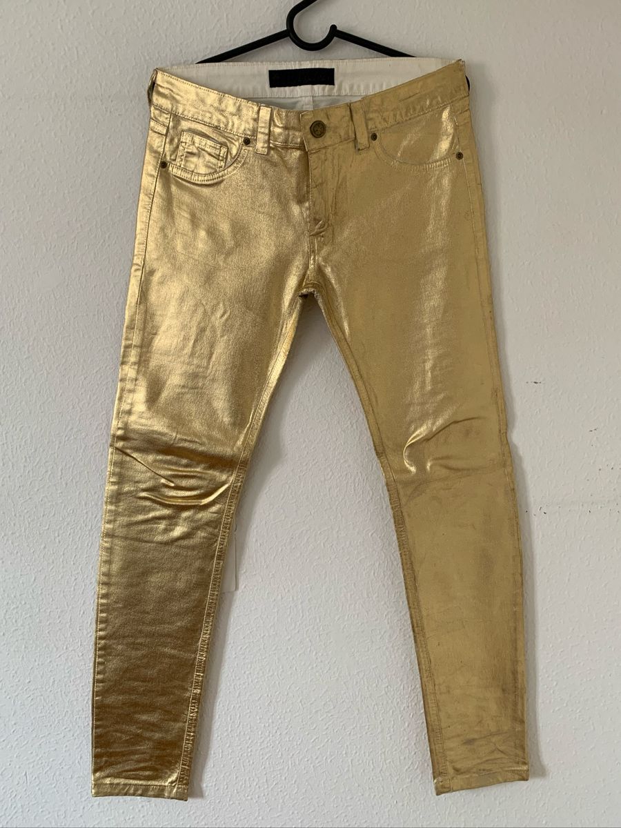 calça dourada masculina