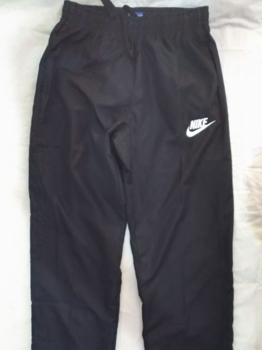 calça larga da nike