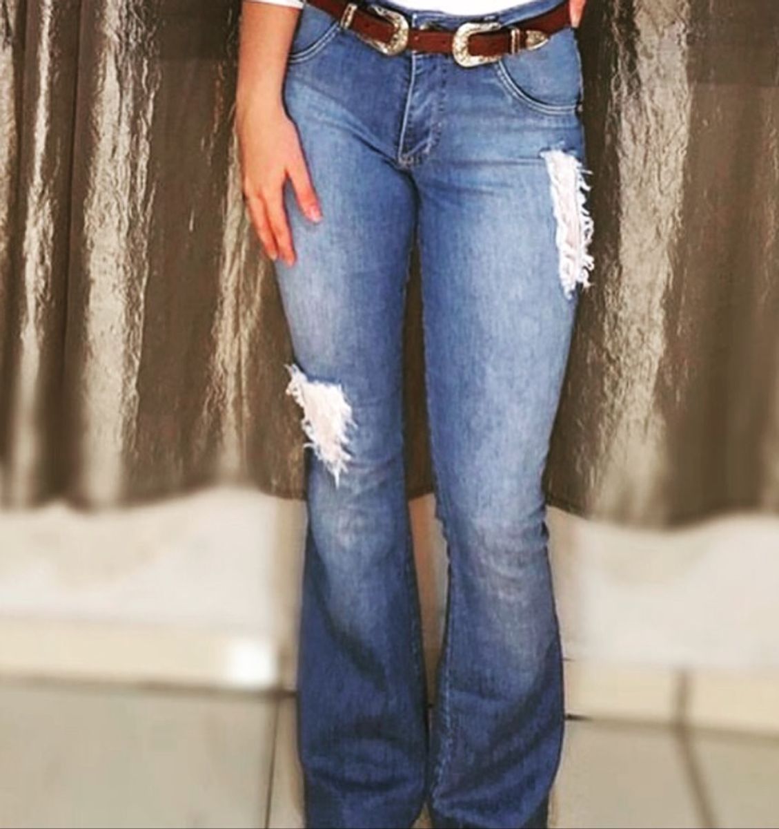 calça jeans flare cos alto