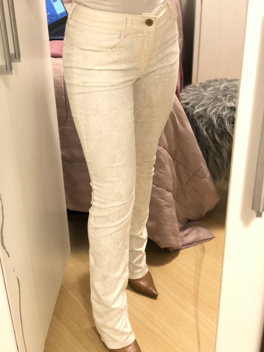 calça flare creme