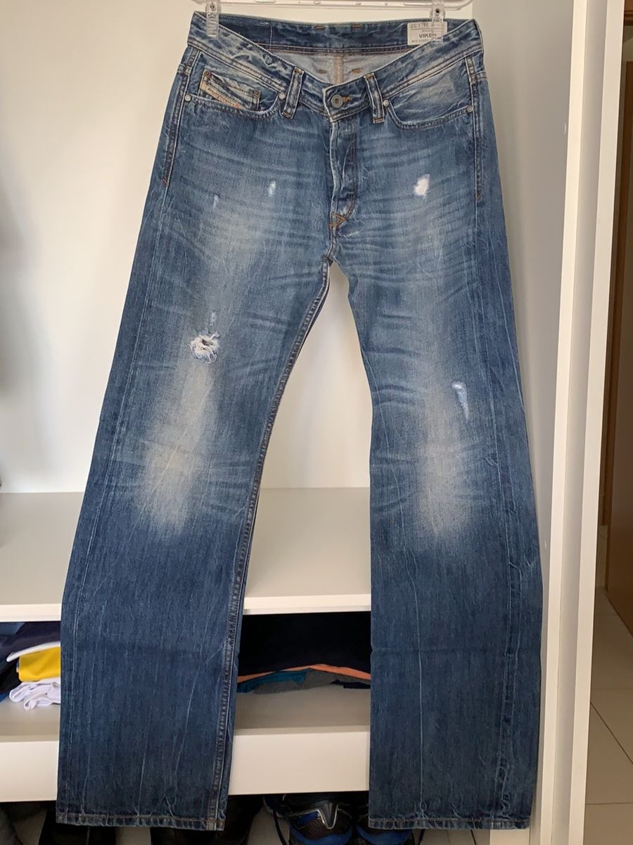 calça jeans masculina com fechamento em botões