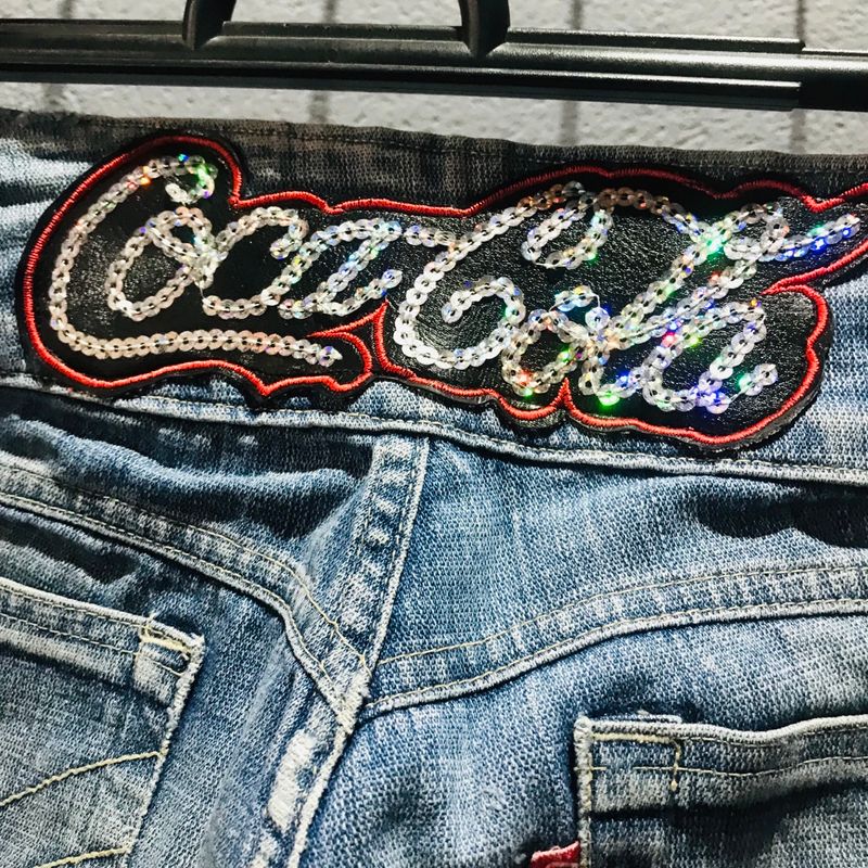 CALCA JEANS LONDON COCA COLA 002.32.03743