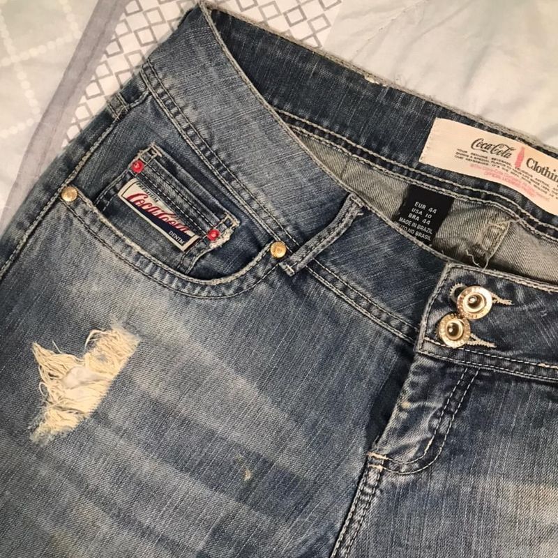 Calça jeans da store coca cola feminina