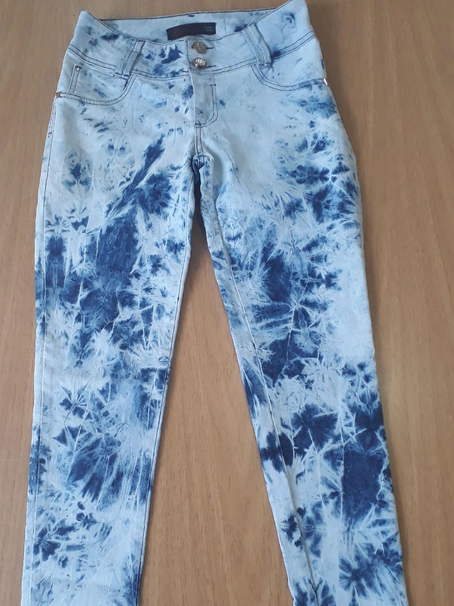 Calça best sale jeans manchada