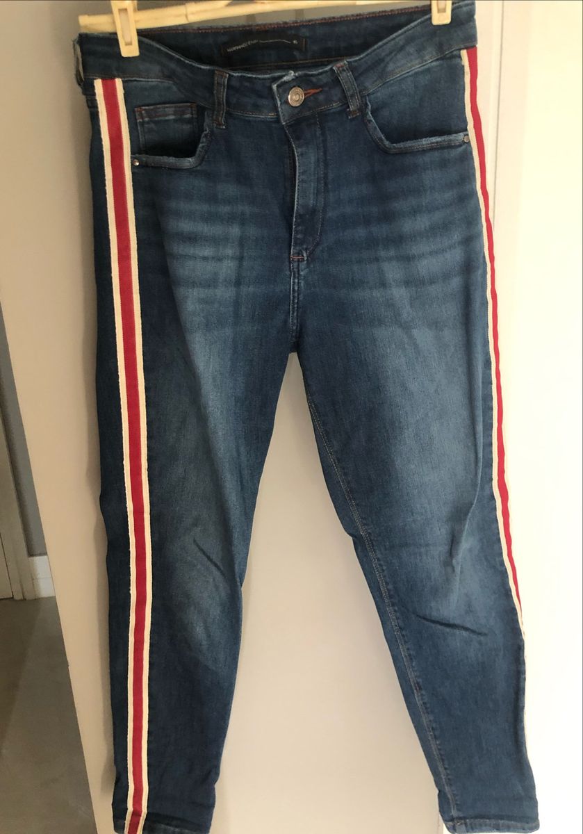 calça jeans com listra lateral feminina