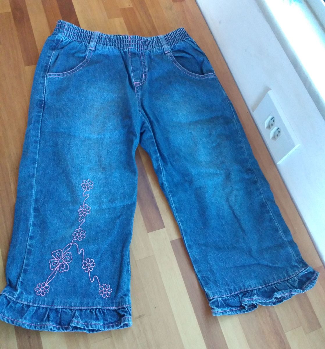 calça jeans curta com bota