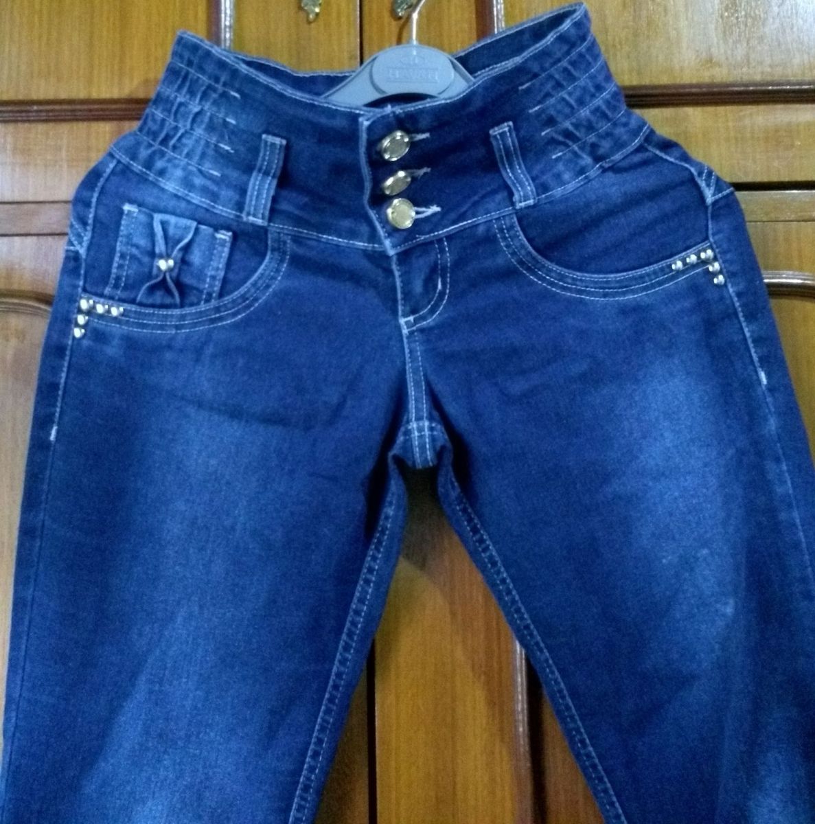 calça jeans cos alto com elastico