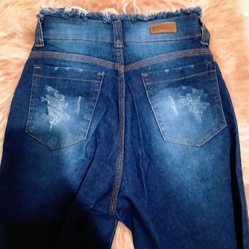 Calca jeans desfiada na hot sale cintura