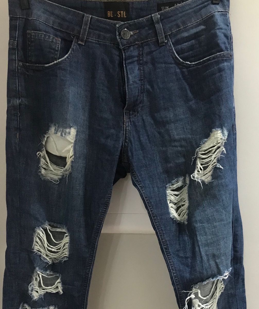 calça jeans slim destroyed