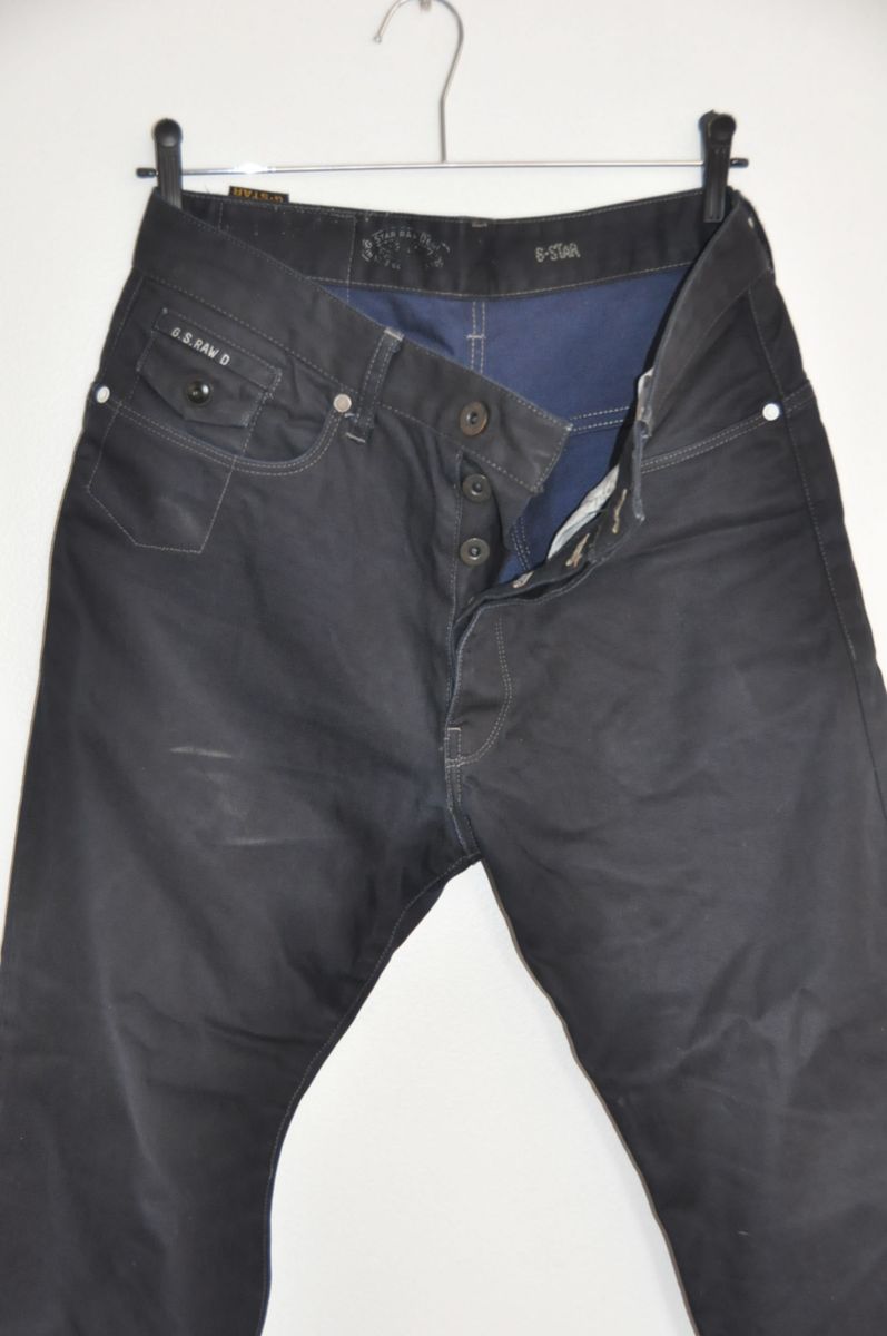 calça jeans encerada masculina