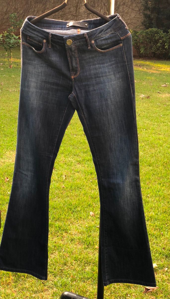 calça jeans flare animale