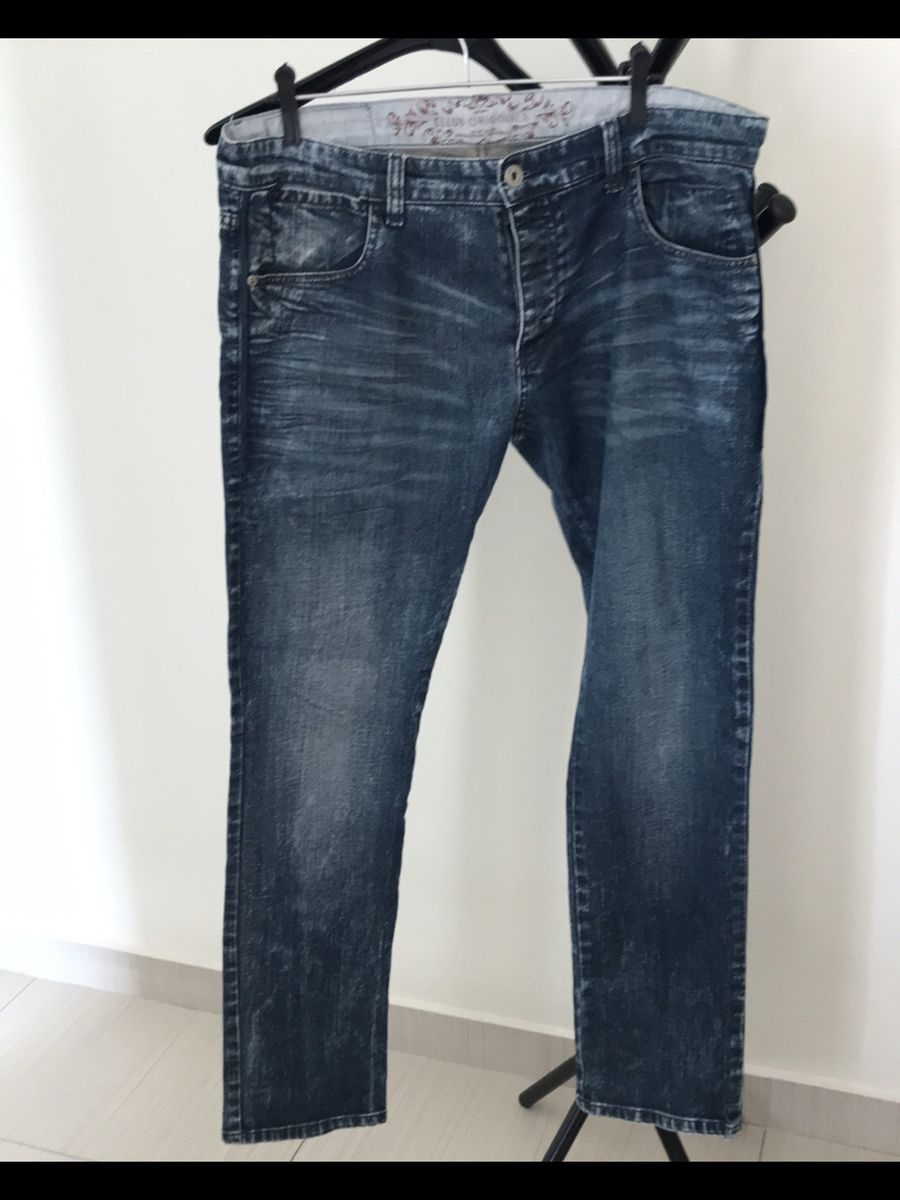 calça jeans masculina com botões na frente