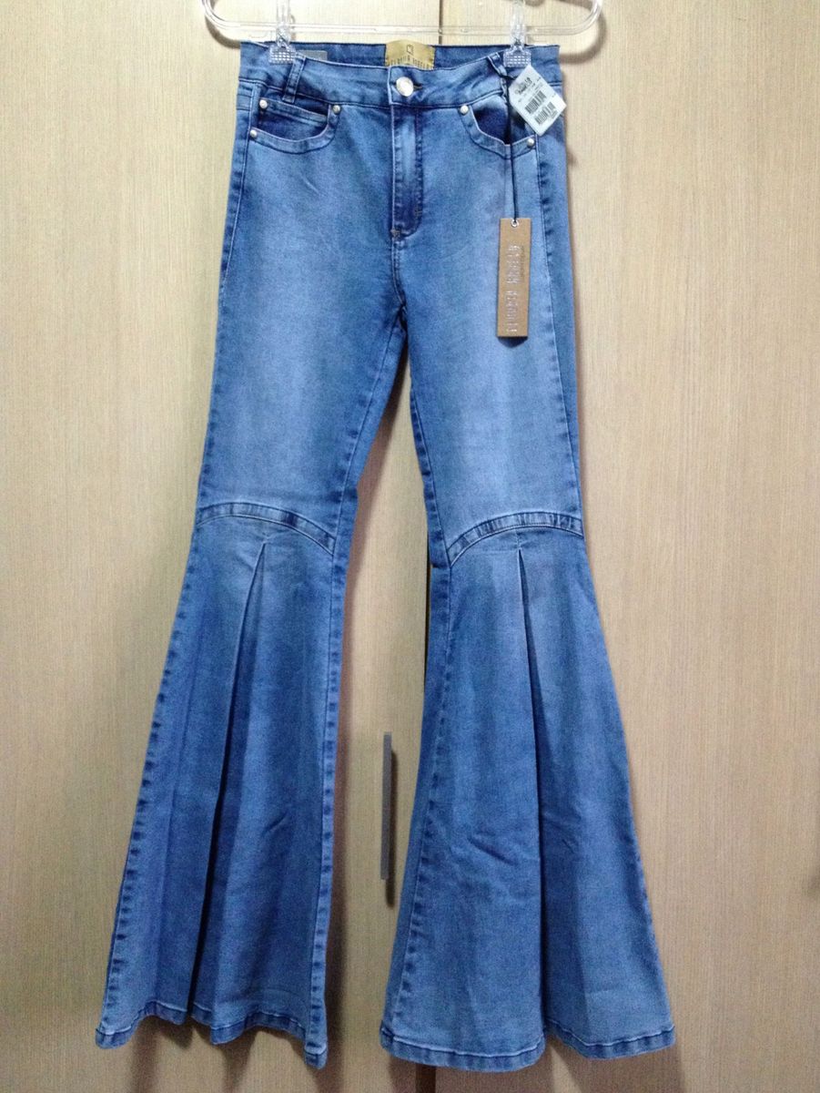 calça jeans maxi flare