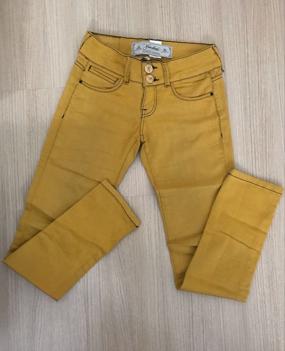 calça jeans mostarda feminina