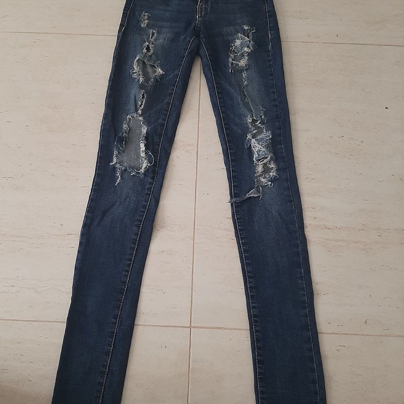 calça jeans rasgada bad cat