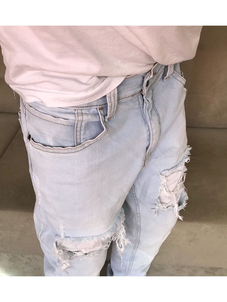 calça jeans rasgadinha masculina