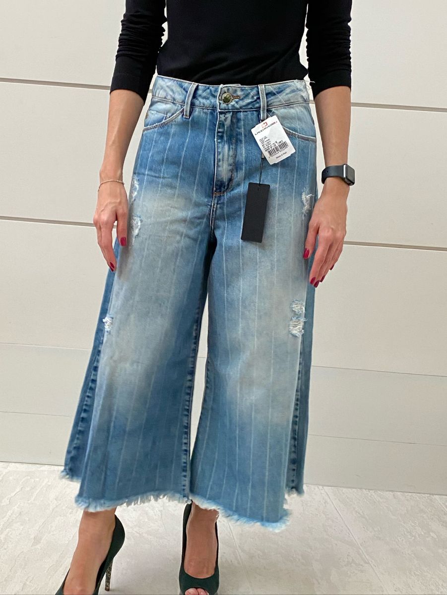 calça jeans listrada do lado
