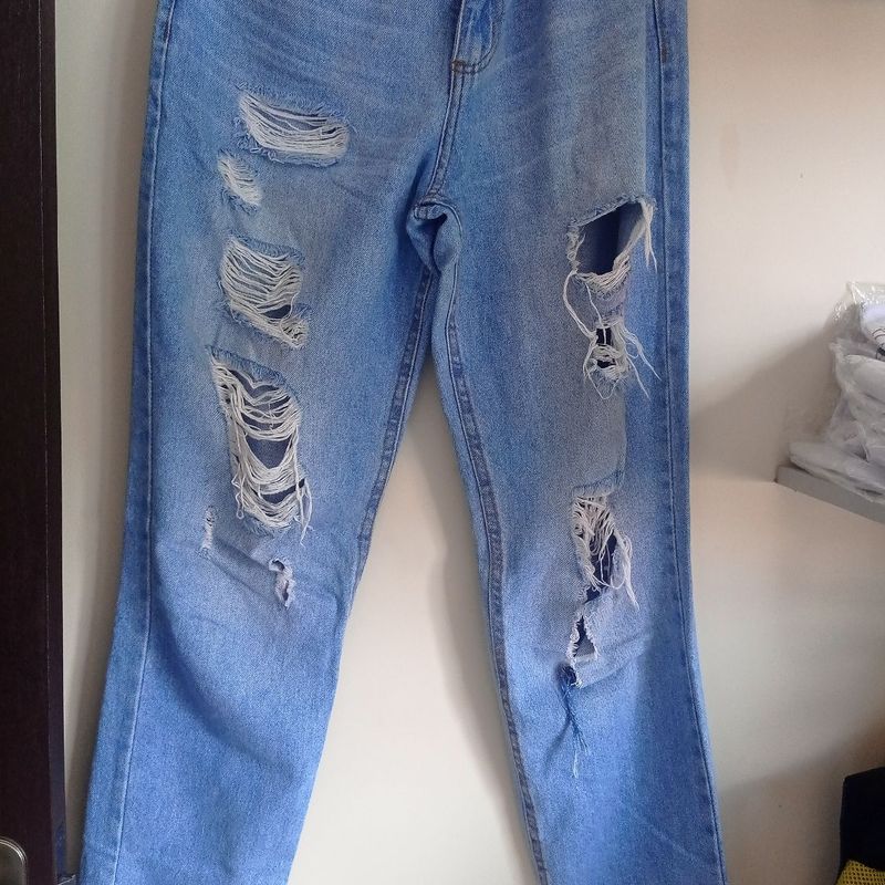 Calça jeans feminina sales toda rasgadinha