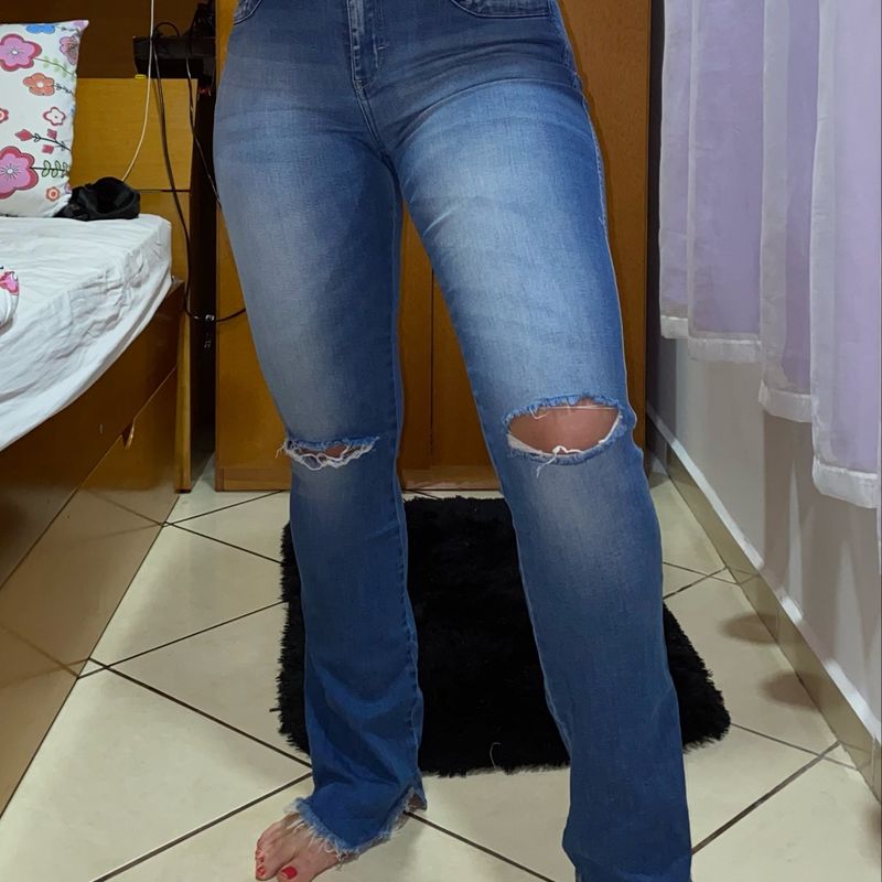 Calça mais hot sale larguinha