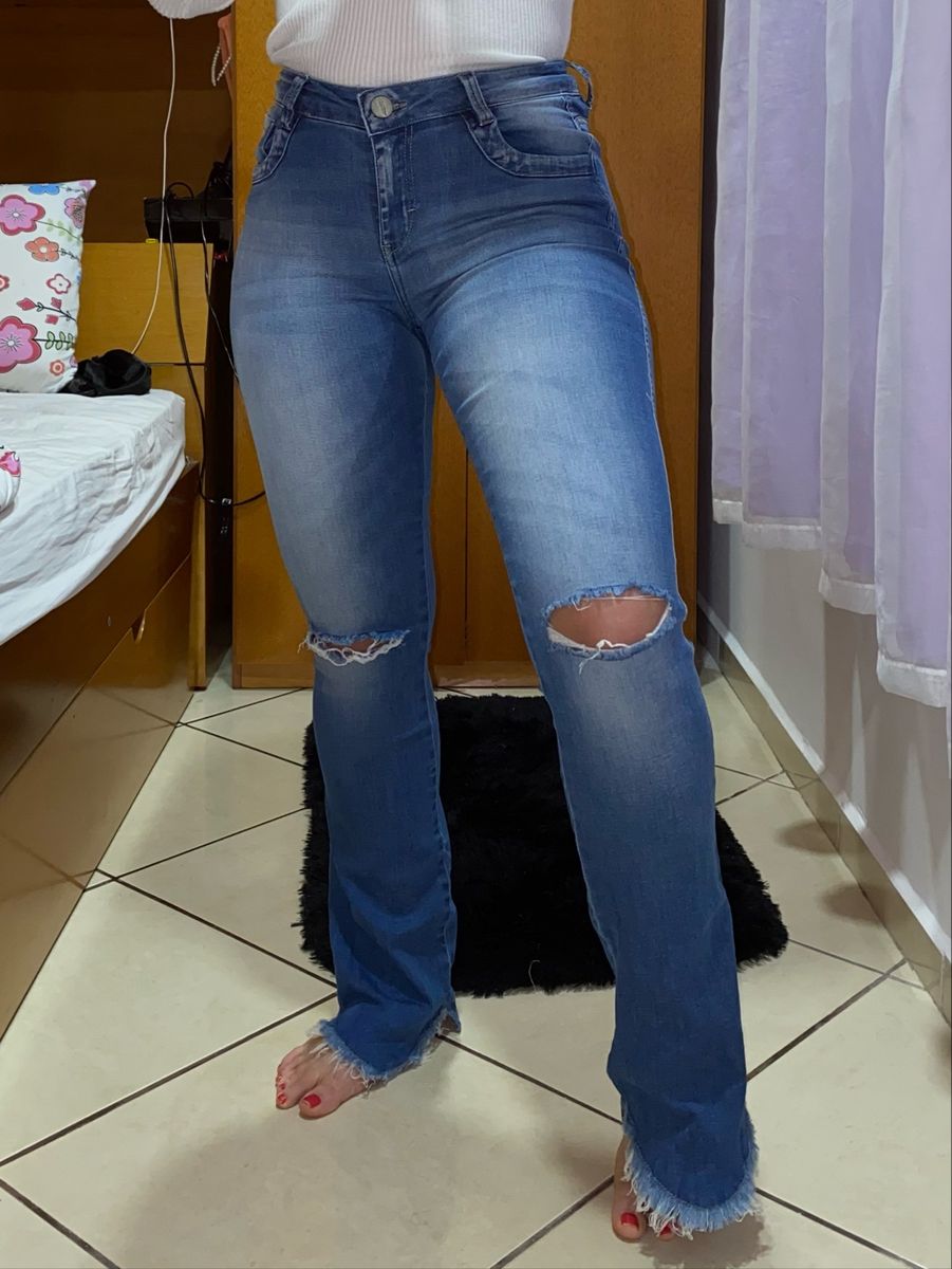 Calça jeans hot sale mais larga