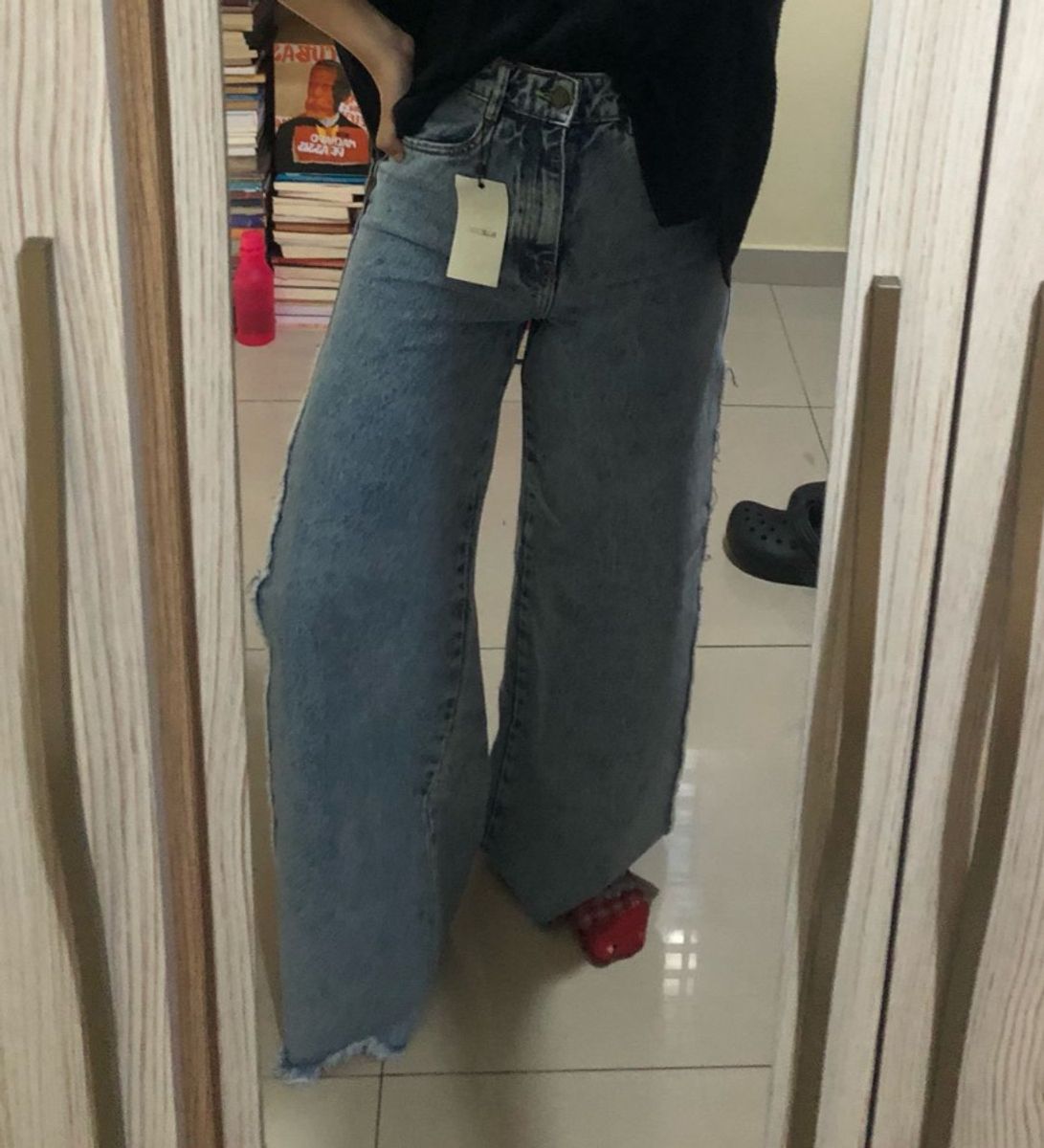 Calça com sale fenda lateral renner