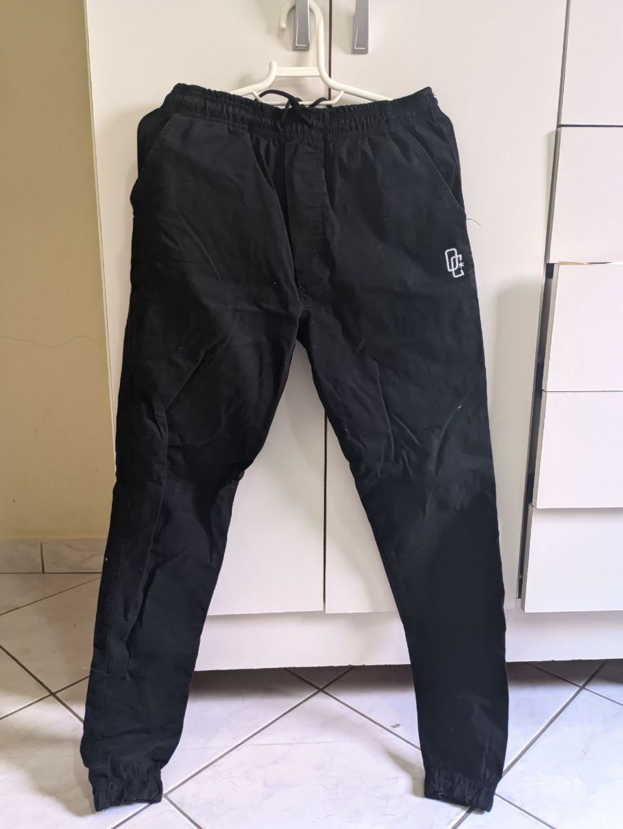 Calça jogger best sale preta overcome